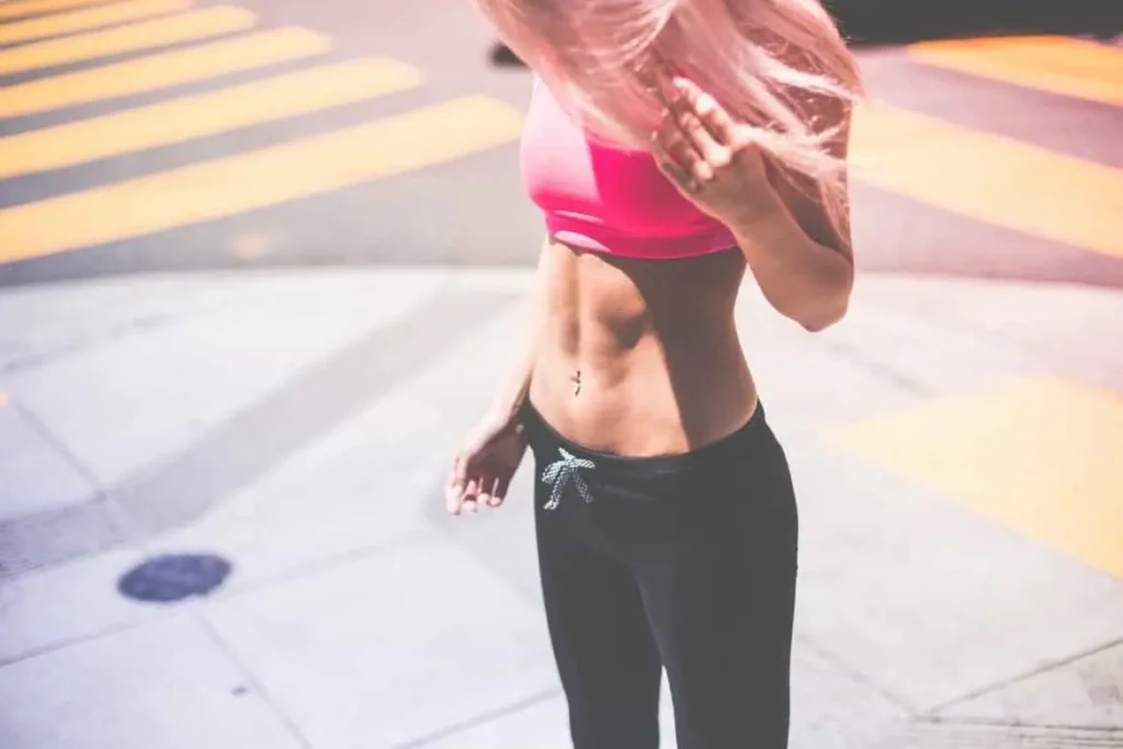 Woman with toned stomach after LA-EMS Body Sculpting Treatment Tamworth